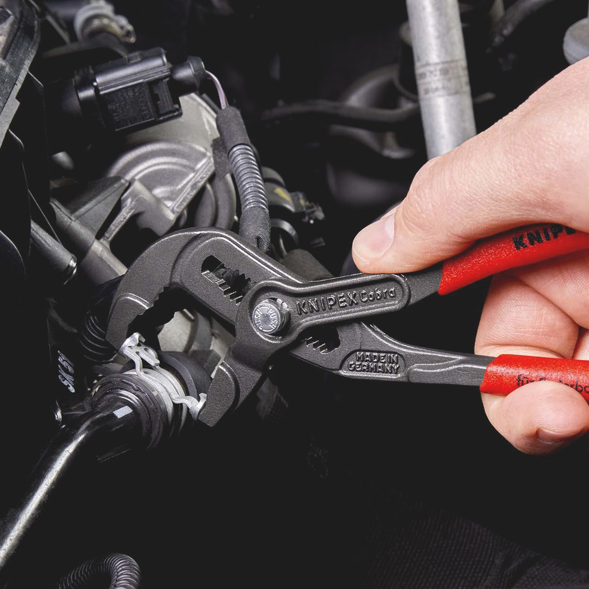 KNIPEX Federbandschellenzange 250 mm – Universelle Greifeinsätze, 25 Einstellungen, max. 70 mm