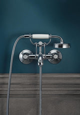 AXOR MONTREUX 2-Griff-Wannenarmatur DN 15, Aufputz, chrom – mit Handbrause & Brausehalter