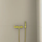 Ideal Standard Idealrain Atelier Brausehalter mit runder Rosette in Brushed Gold – Wandmontage